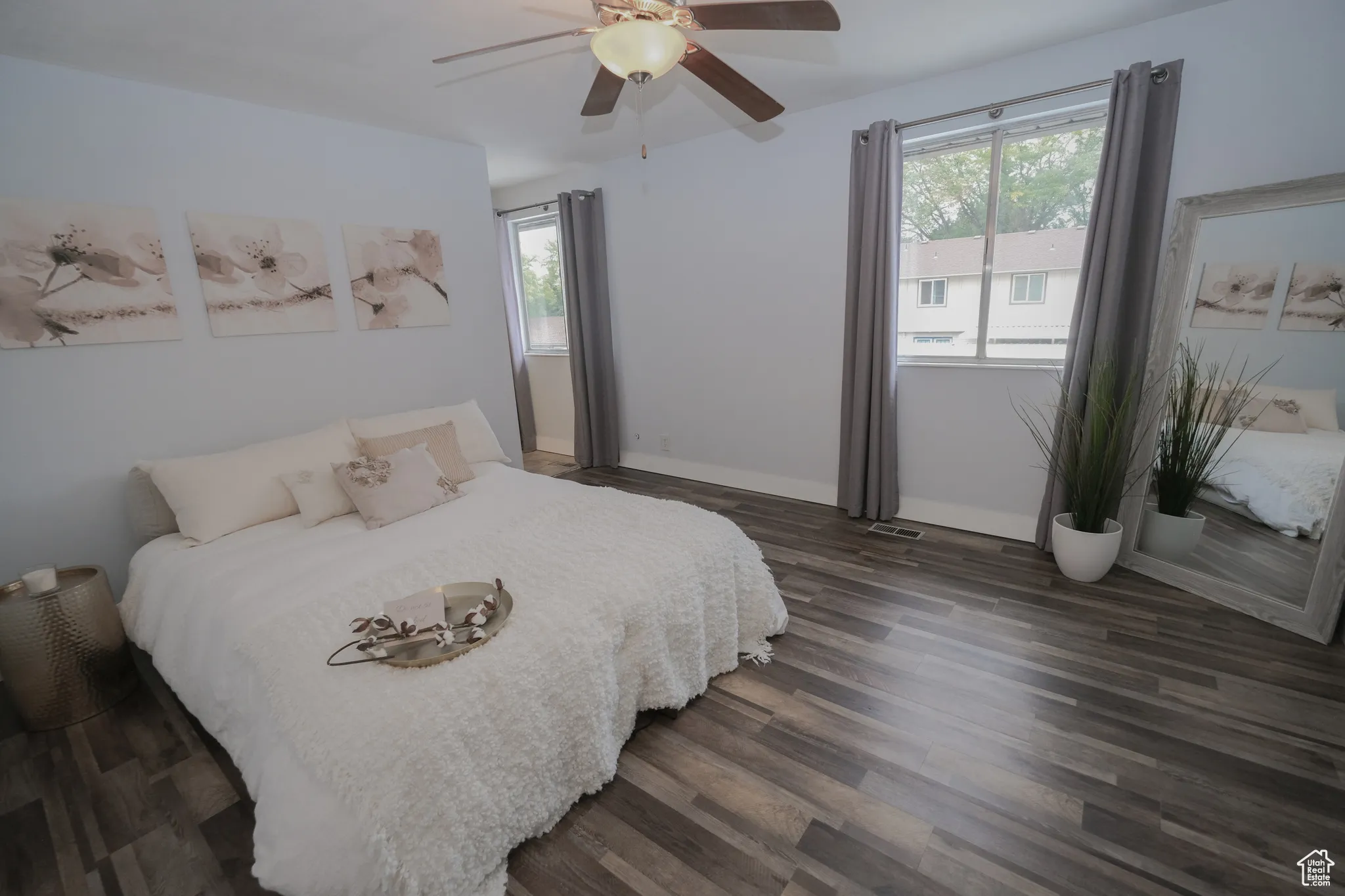 Primary Bedroom with en suite, tile shower with glass door and double closets.
