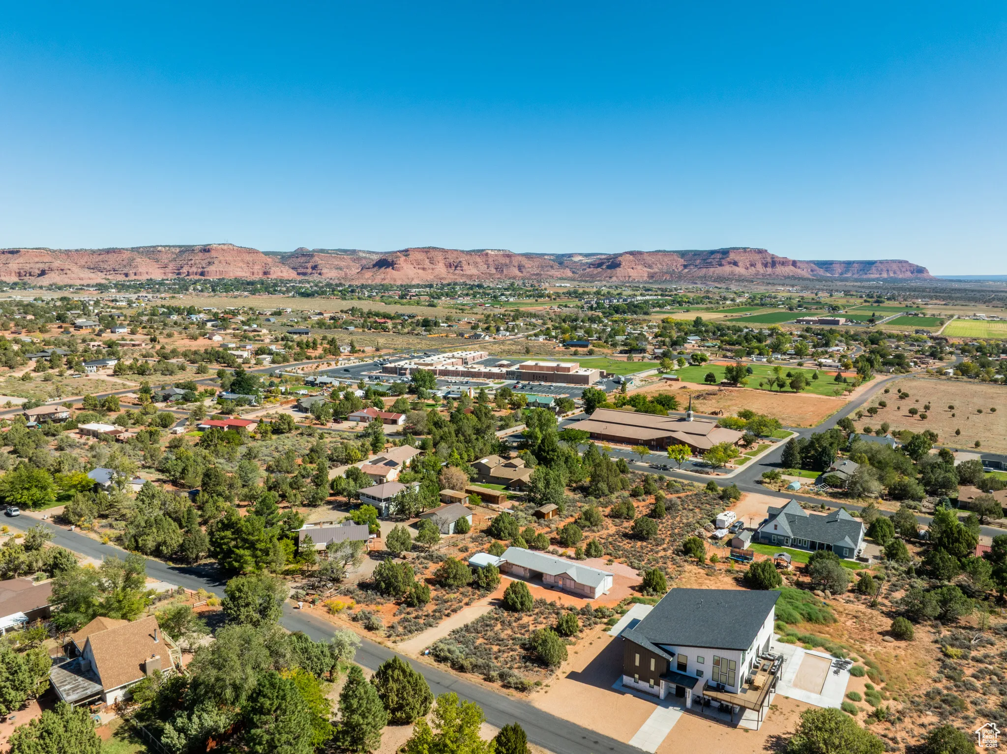 Aerial view of residential area with a mountain backdrop
