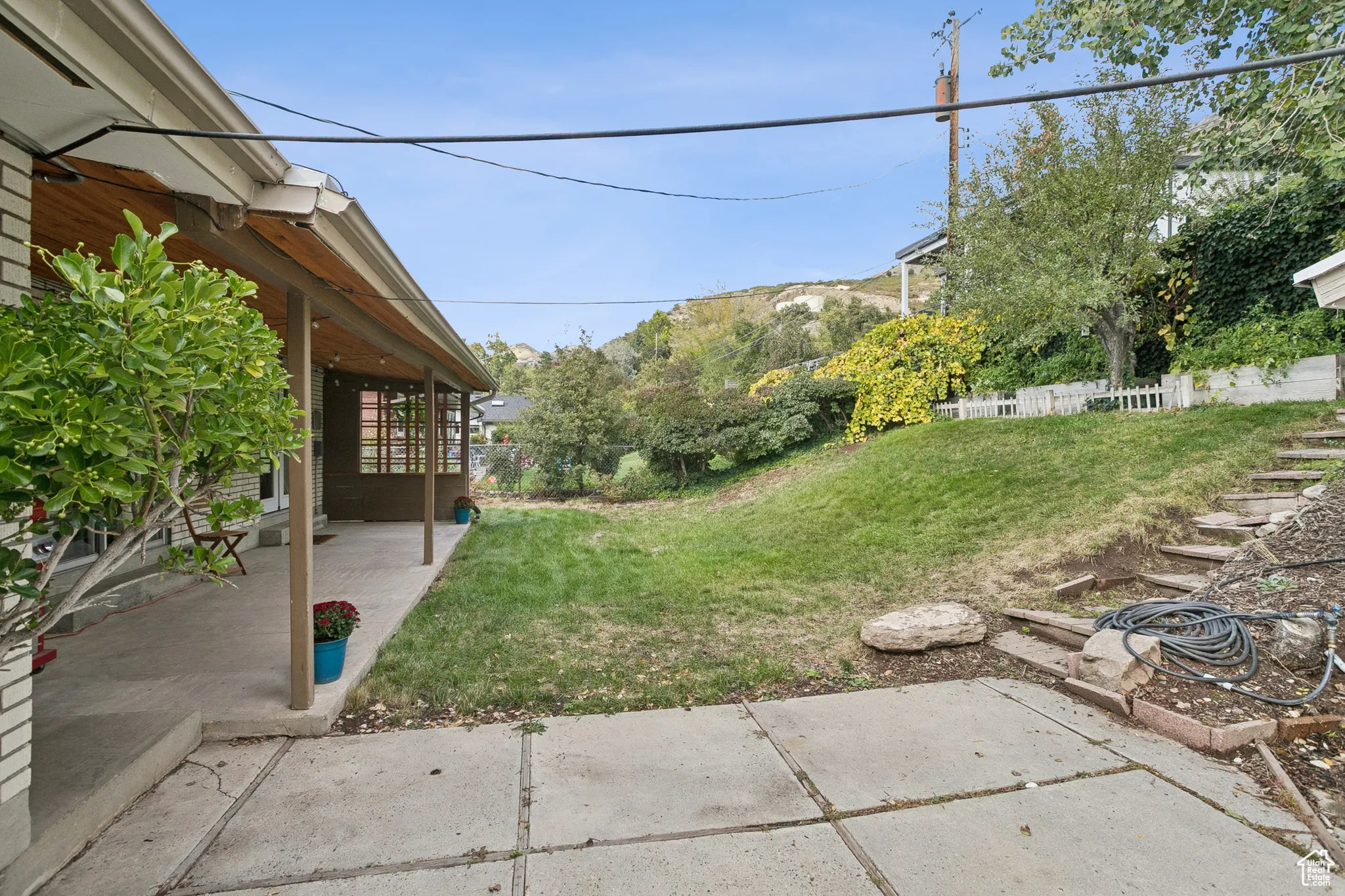 View of yard with a patio
