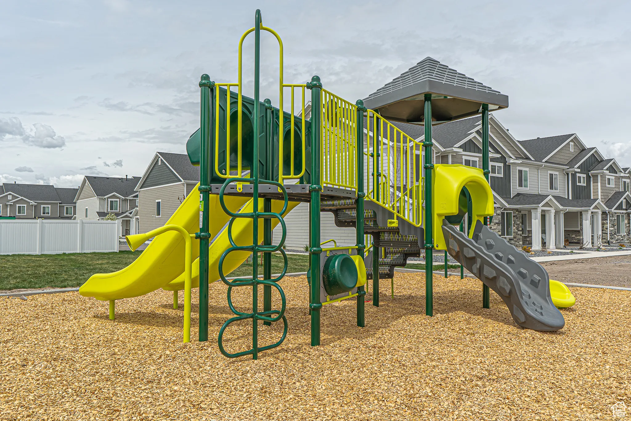 Communal playground featuring a residential view