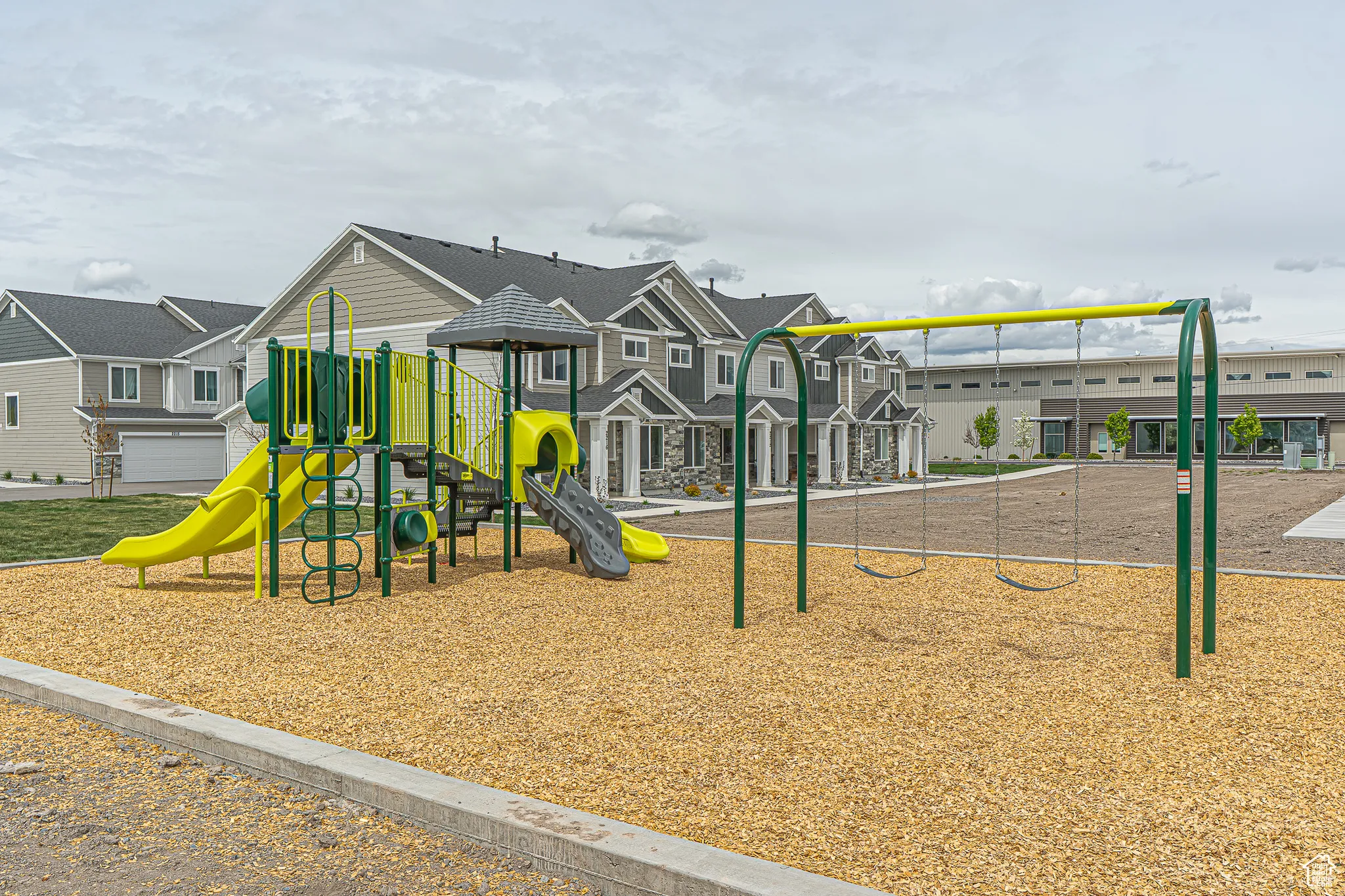 Communal playground featuring a residential view