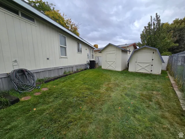 View of yard featuring a storage shed