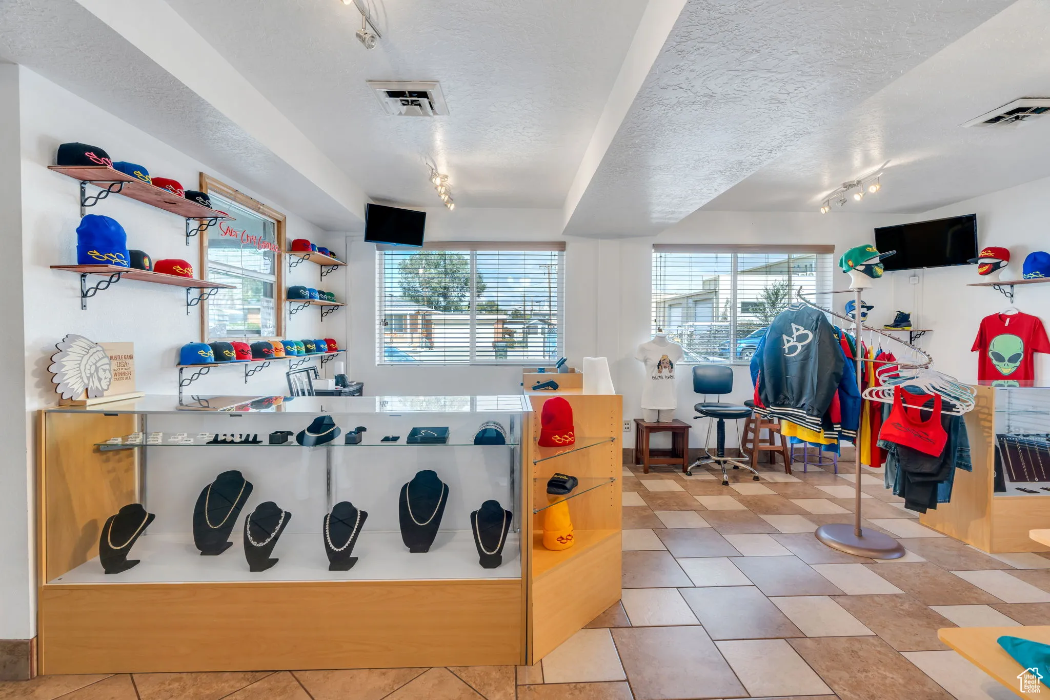 Rec room featuring a textured ceiling