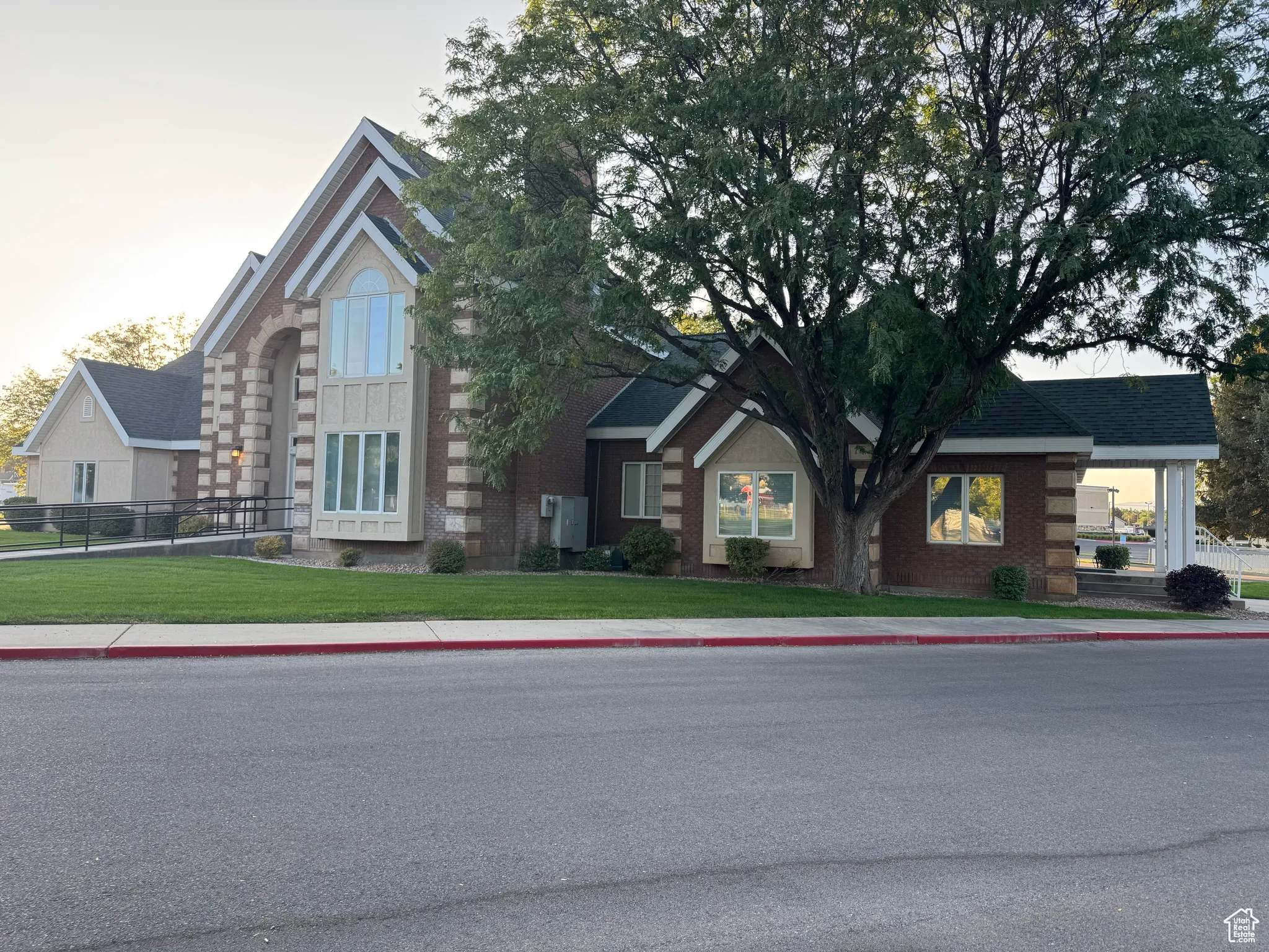 View of front of house featuring brick siding