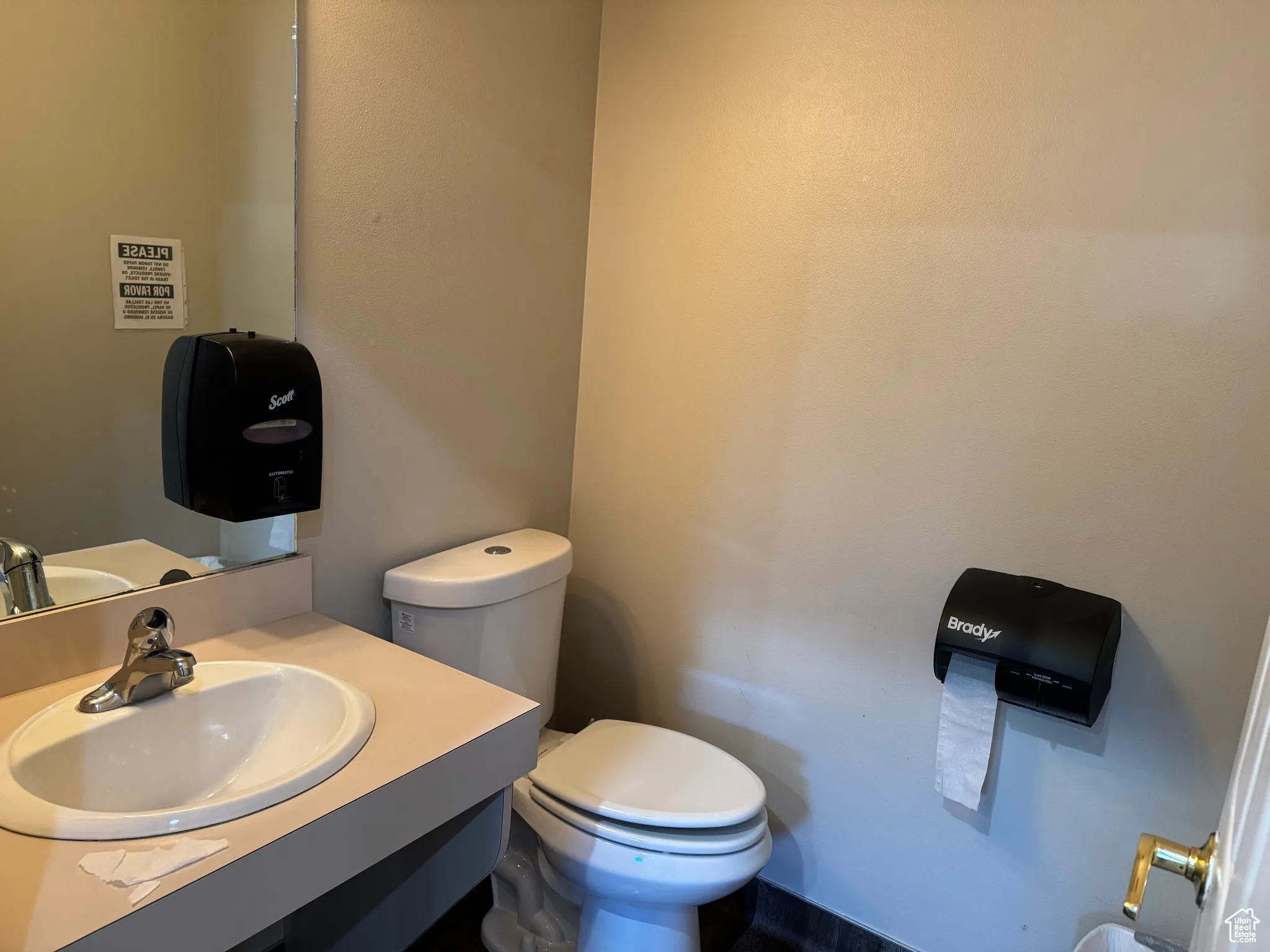 Half bath with toilet and vanity