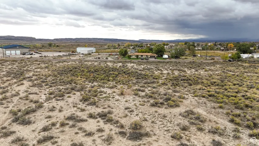 View of yard featuring a view of rural / pastoral area and a mountain view