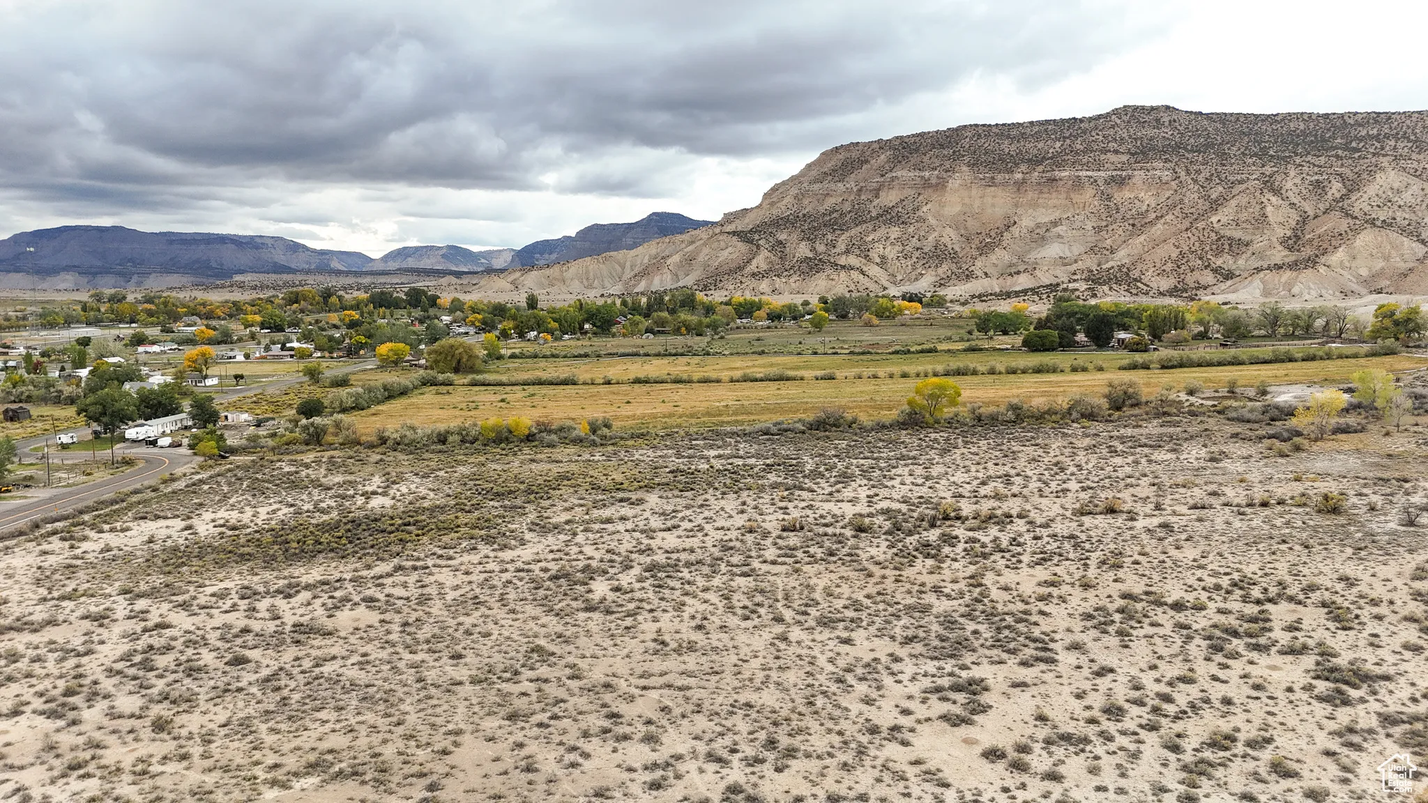 View of mountain backdrop featuring rural landscape