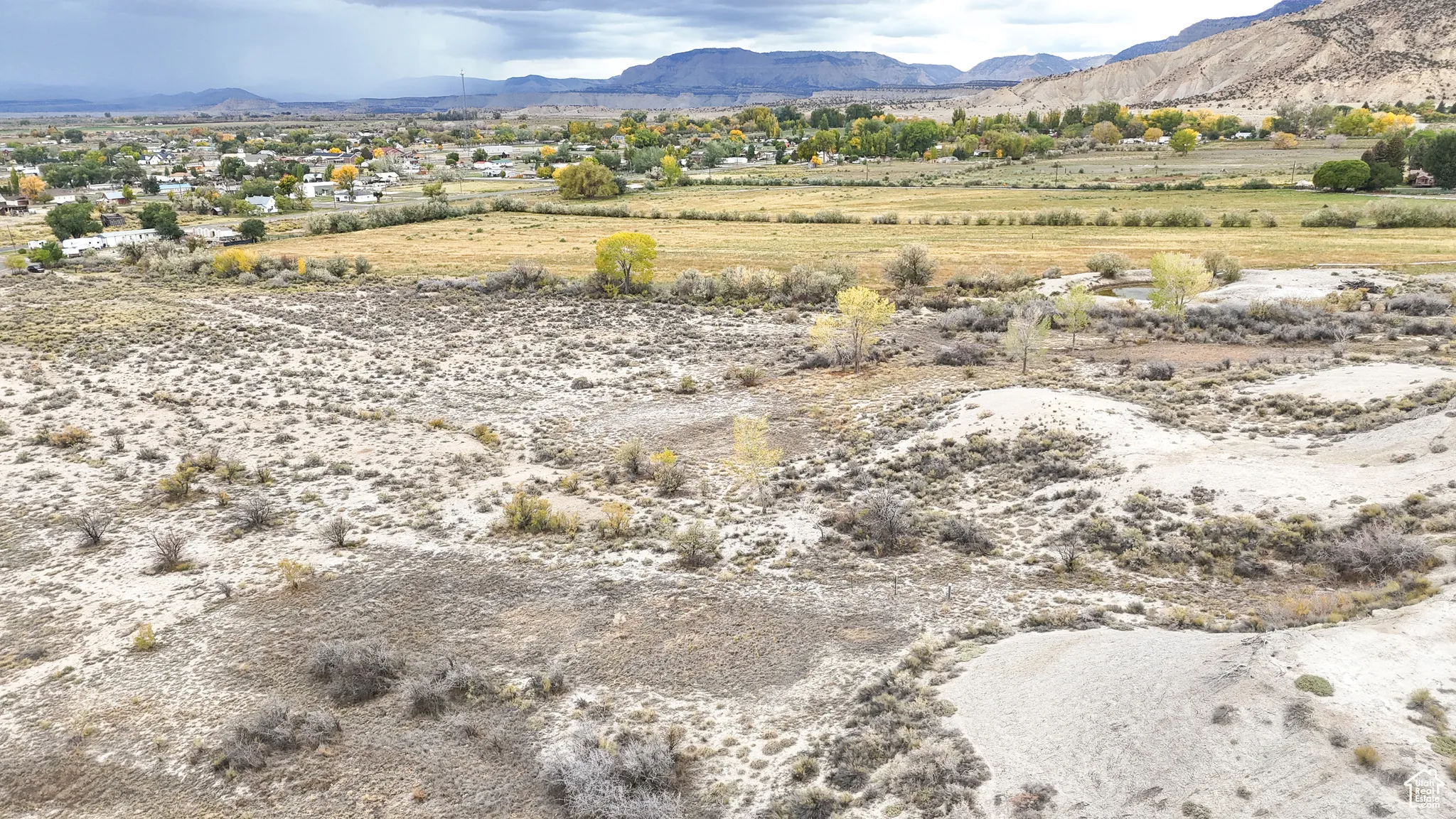 View of mountain background featuring rural landscape