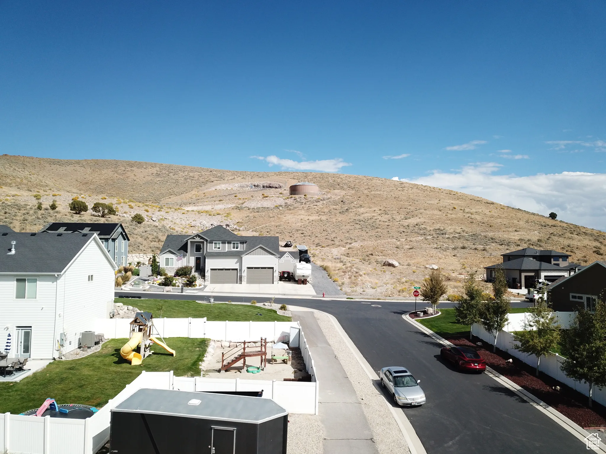 View of mountain background featuring nearby suburban area