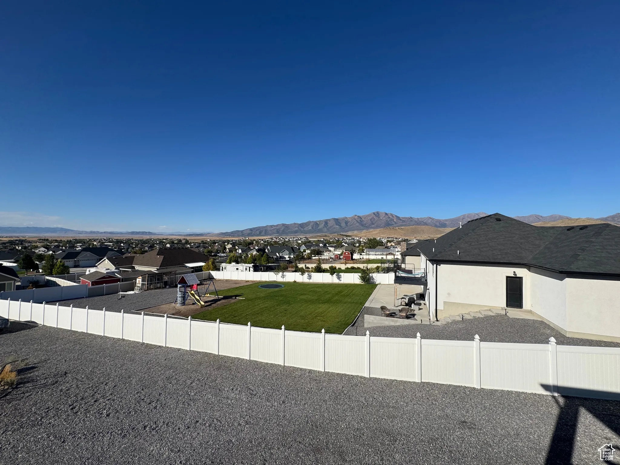 View of mountain background with nearby suburban area