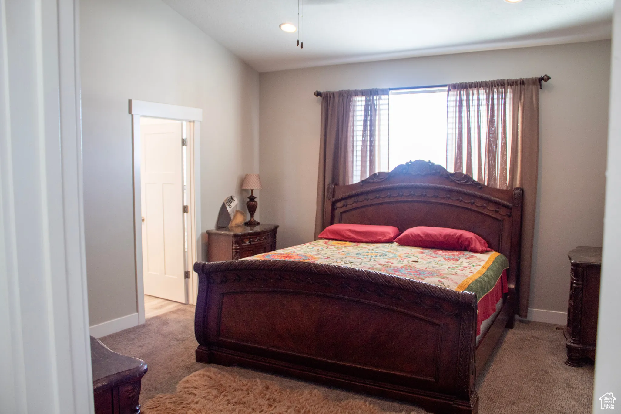 Carpeted bedroom featuring baseboards and recessed lighting