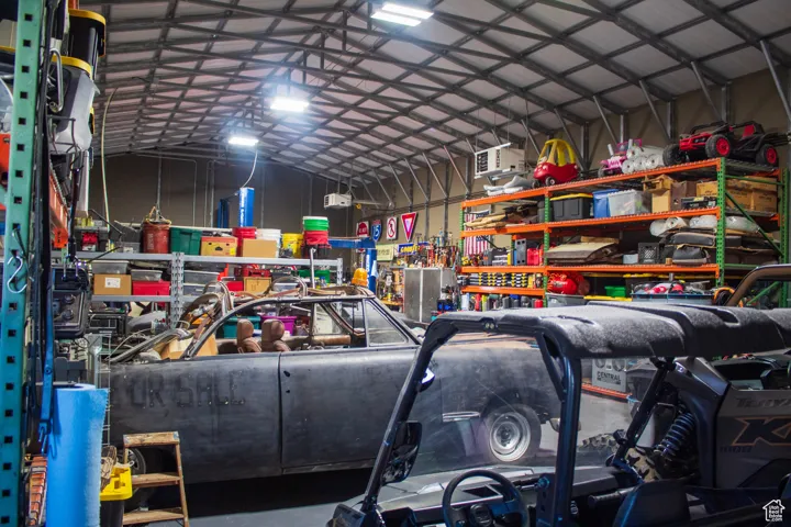 Garage featuring a heating unit