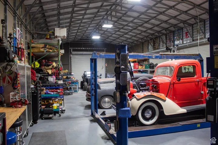 Garage with metal wall and a workshop area