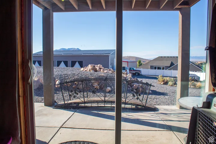 View of patio with a mountain view