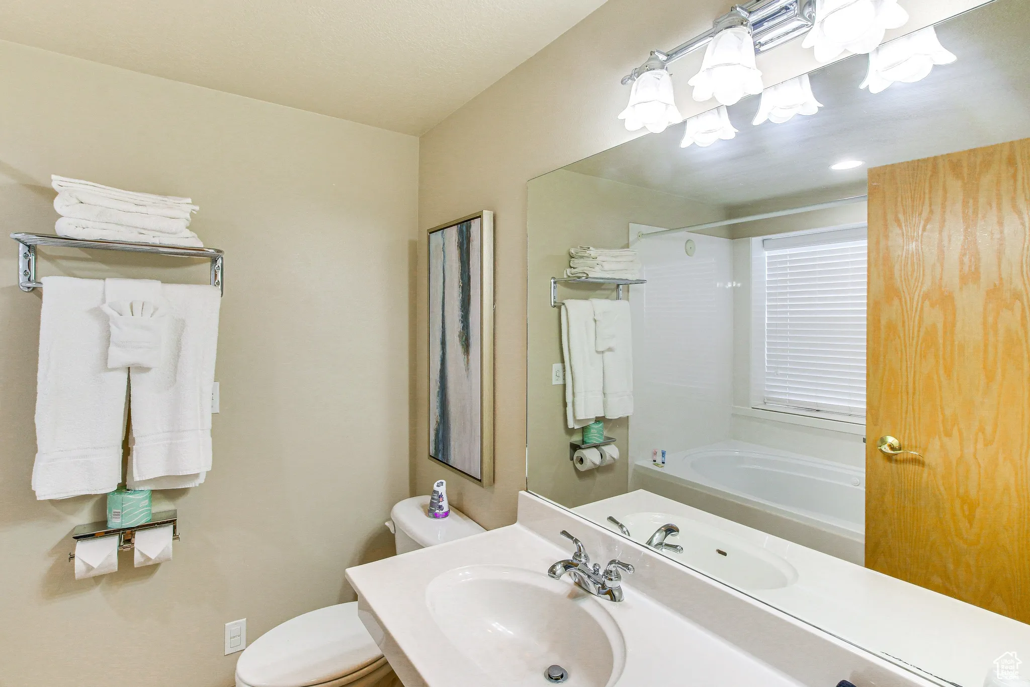 Bathroom featuring bathing tub / shower combination and vanity