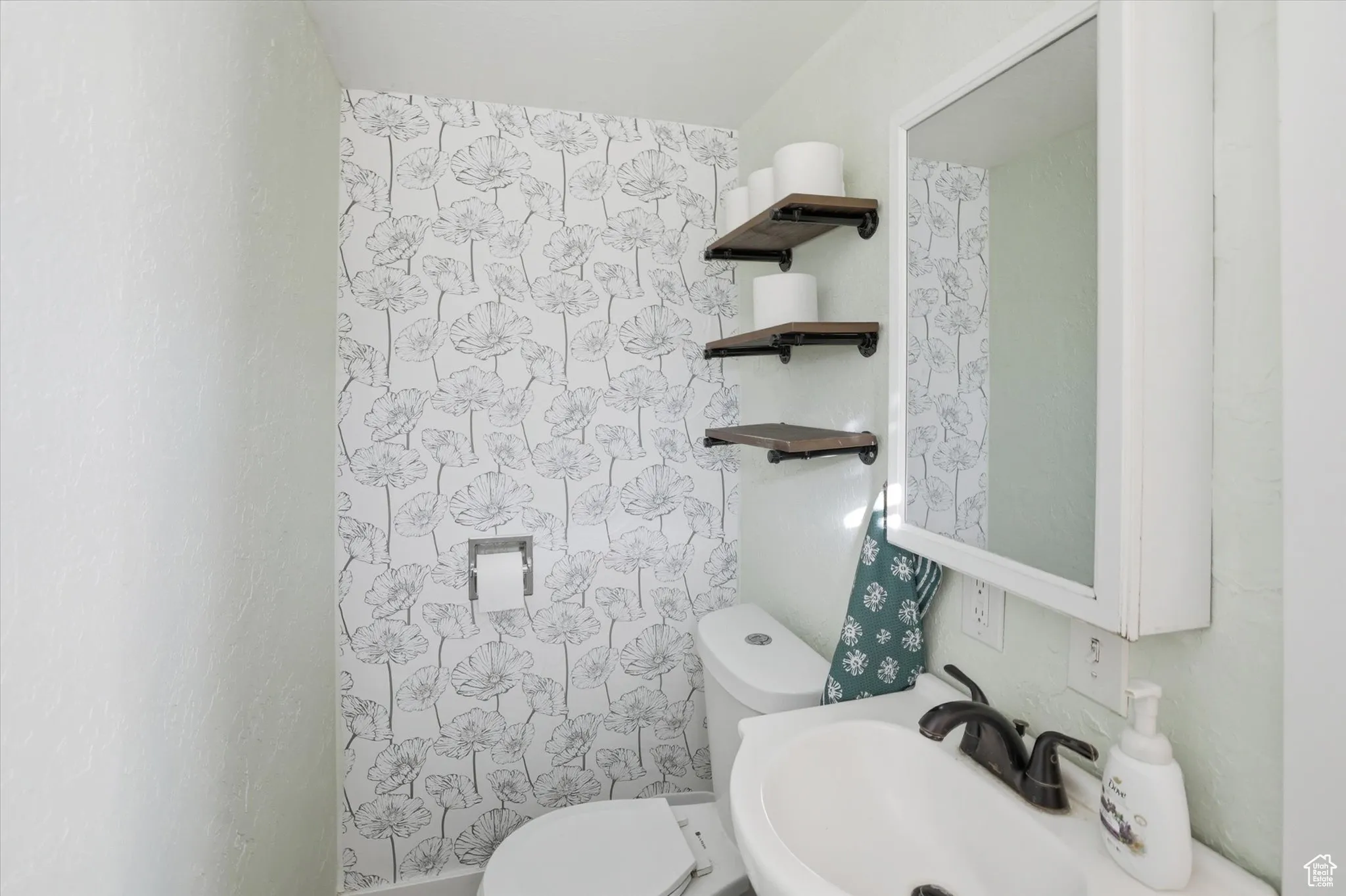 Bathroom with a sink and toilet