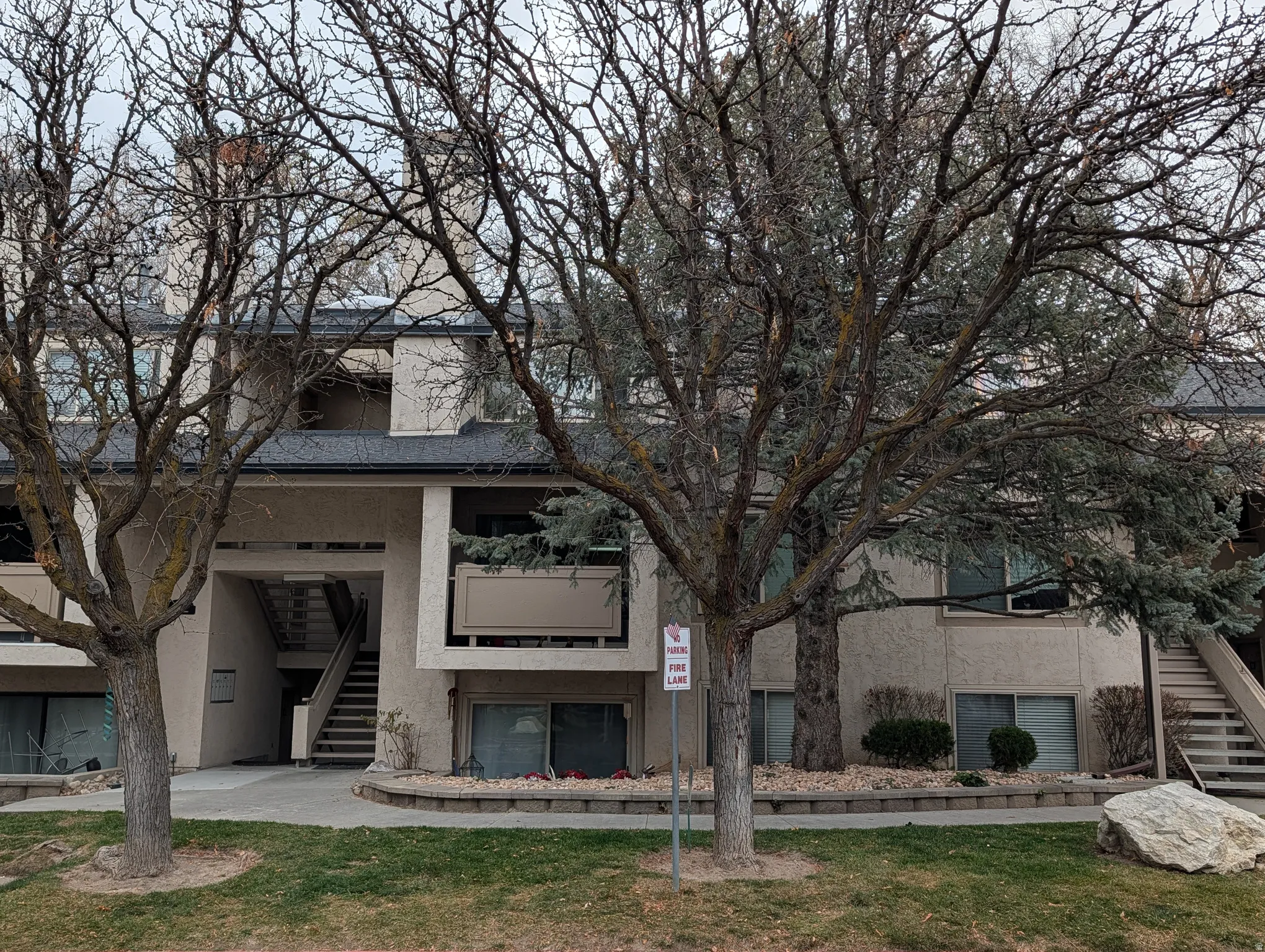 View of property featuring stairway