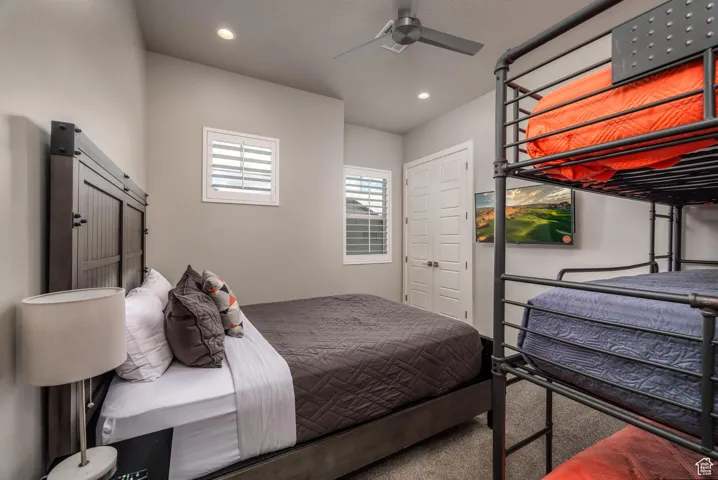 Bedroom featuring carpet floors, recessed lighting, and a ceiling fan