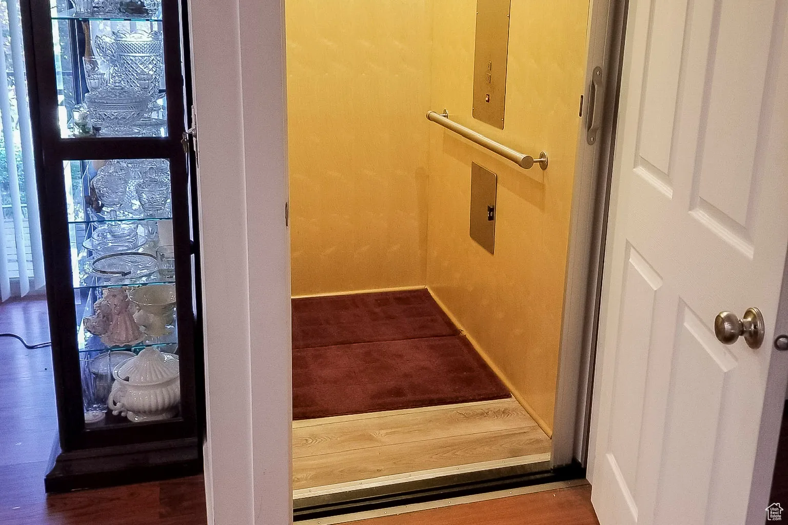 Elevator with wood finished floors