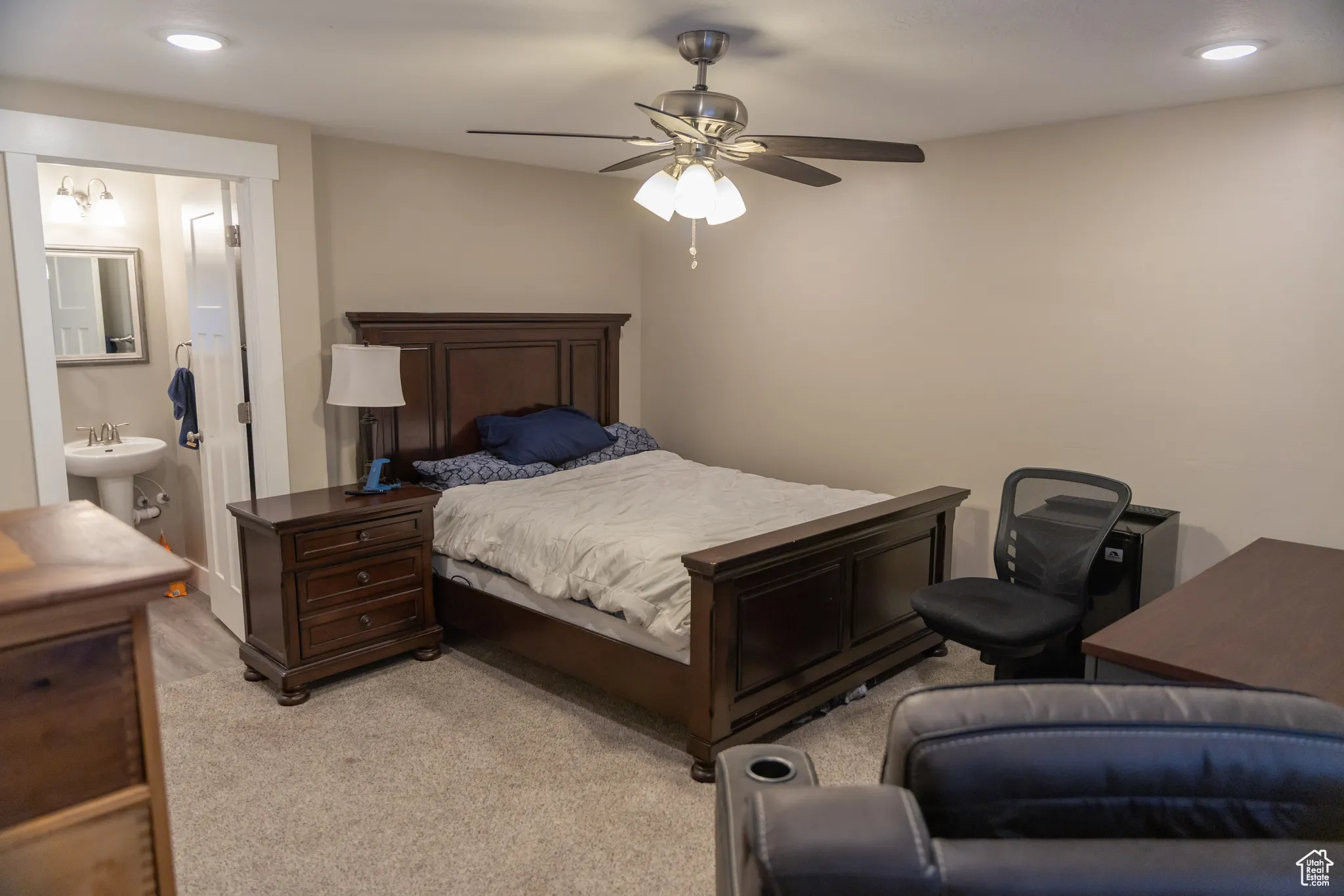 Bedroom featuring recessed lighting, a ceiling fan, and ensuite bathroom