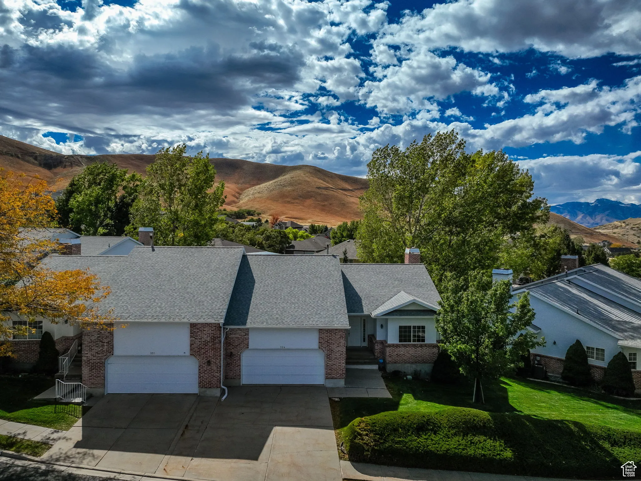 View of condo with mountain background.