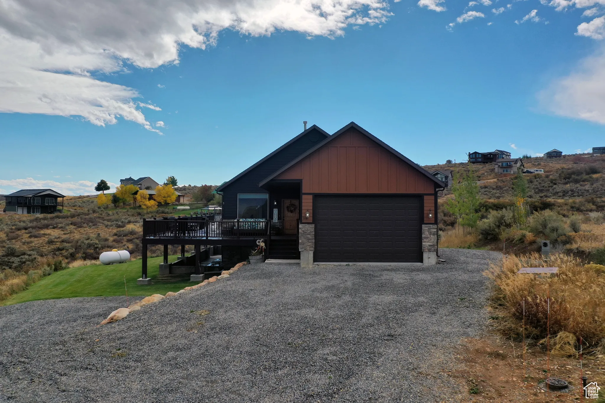 Garage featuring driveway
