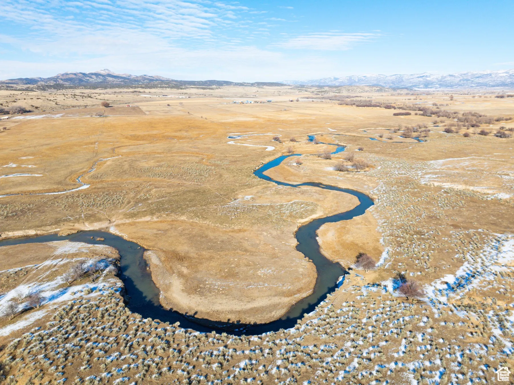 Aerial view of property's location featuring mountains and rural landscape