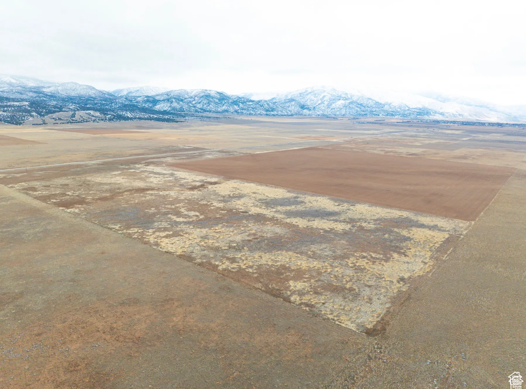 Aerial view of sparsely populated area featuring mountains