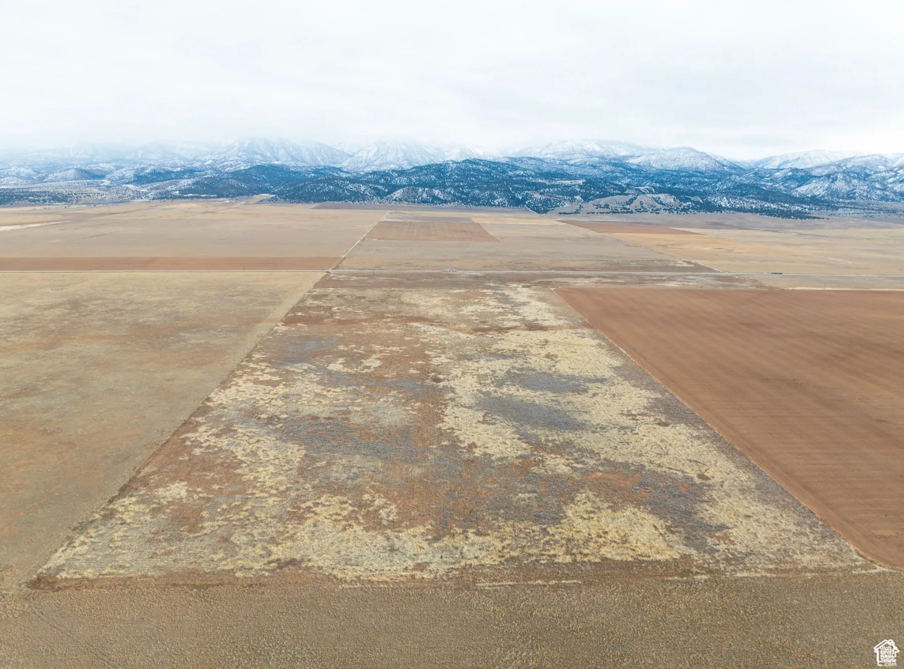 Aerial view of sparsely populated area featuring mountains