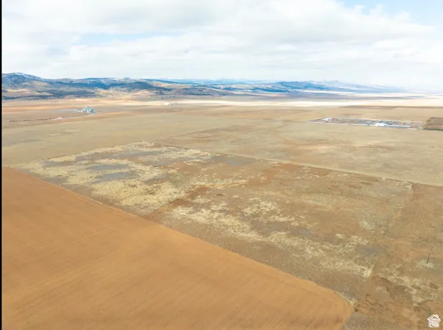 Aerial view of sparsely populated area with mountains