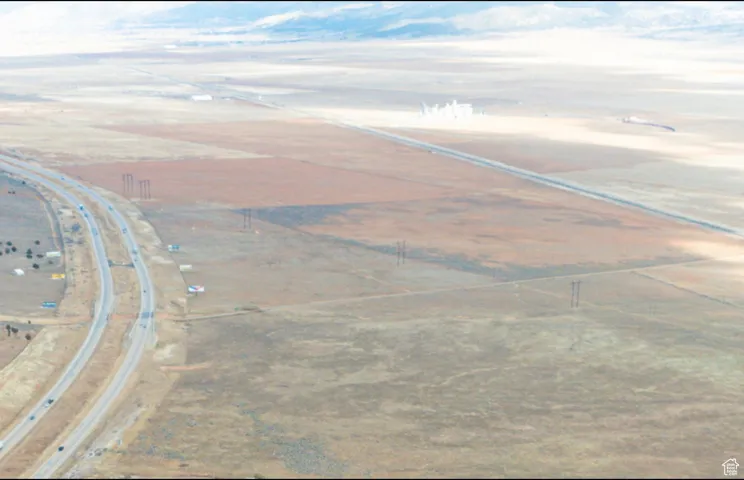 Aerial view of property and surrounding area with rural landscape