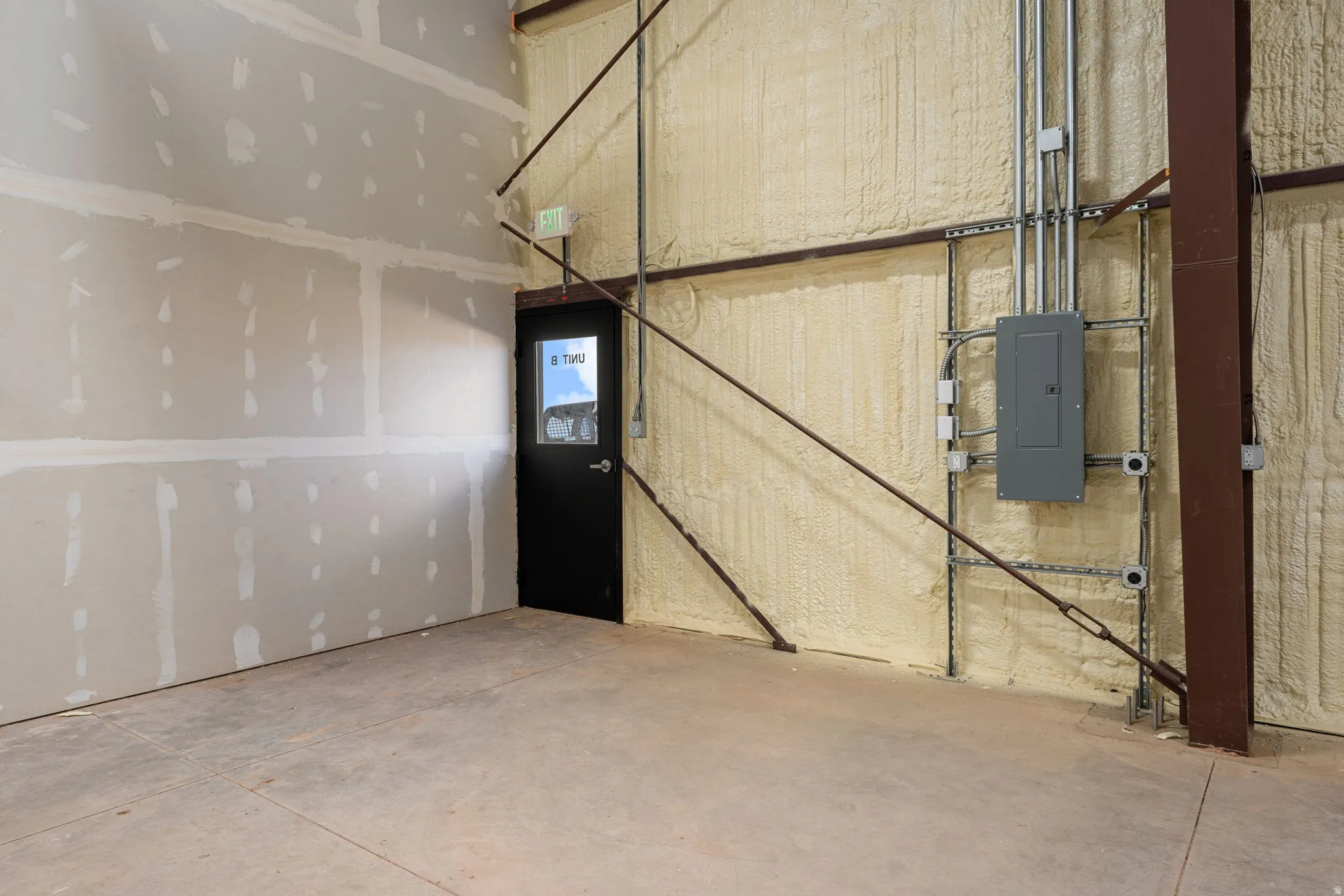 Garage featuring electric panel