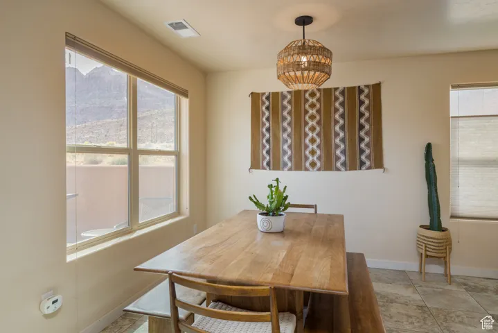 Dining area with healthy amount of natural light