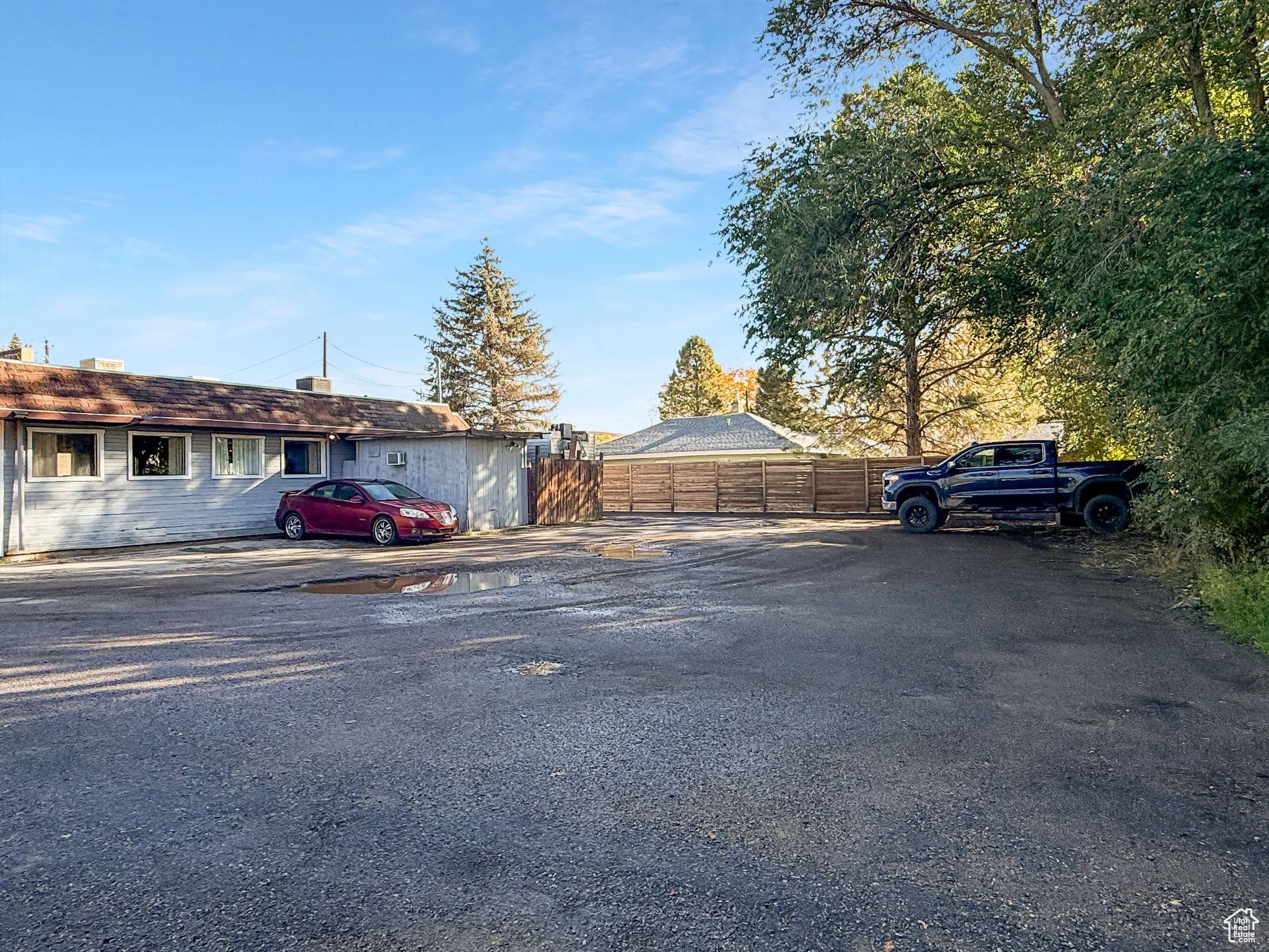 View of front facade featuring a chimney
