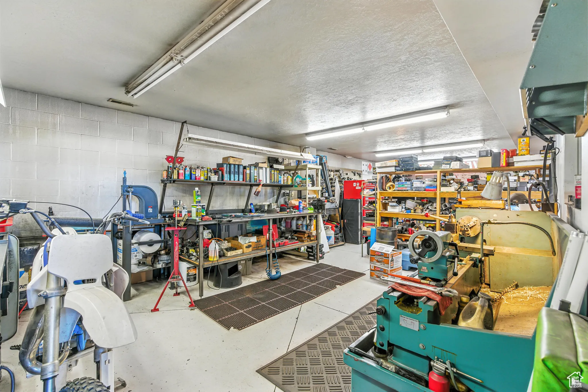 Garage with a heating unit and concrete block wall