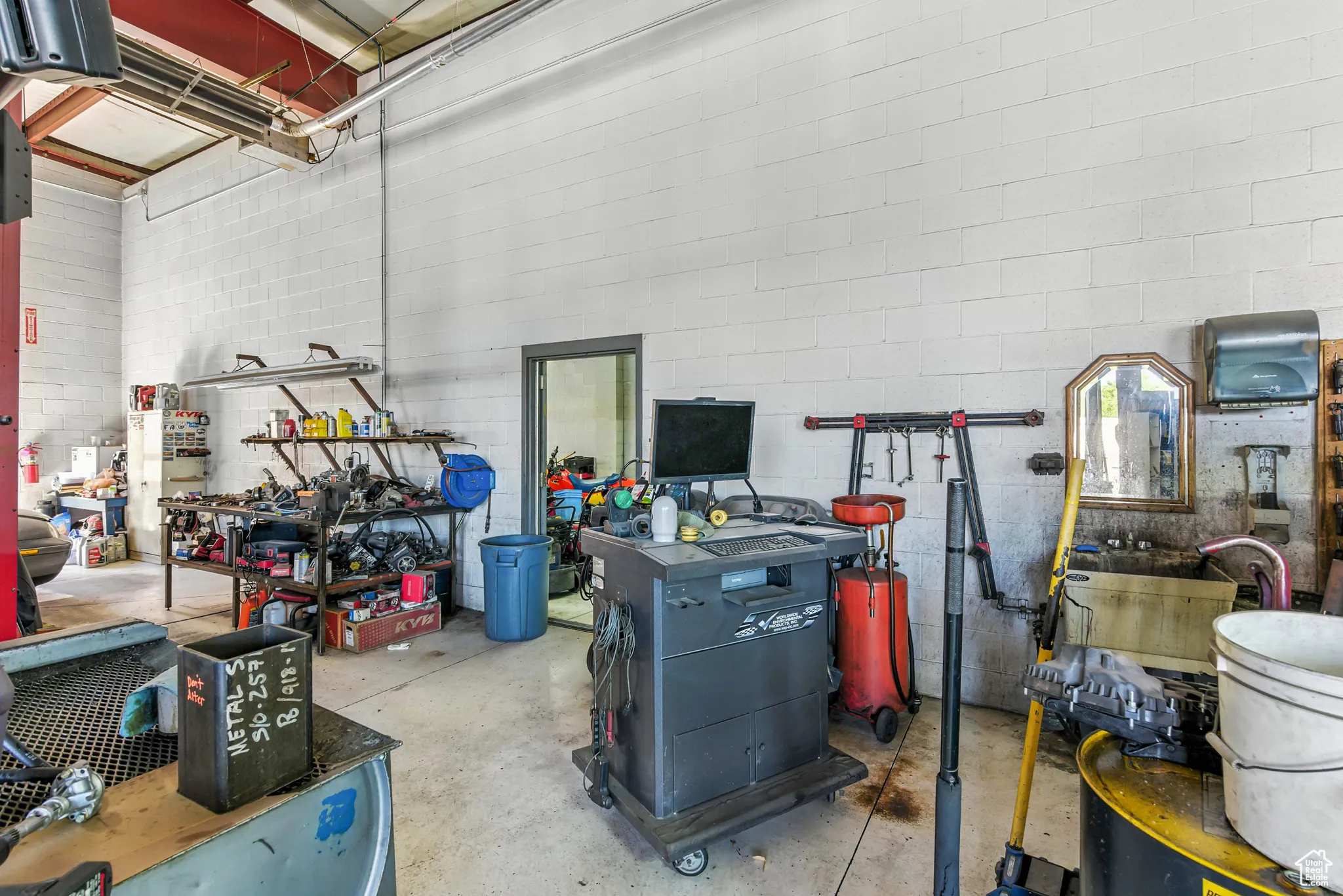 Garage featuring a sink