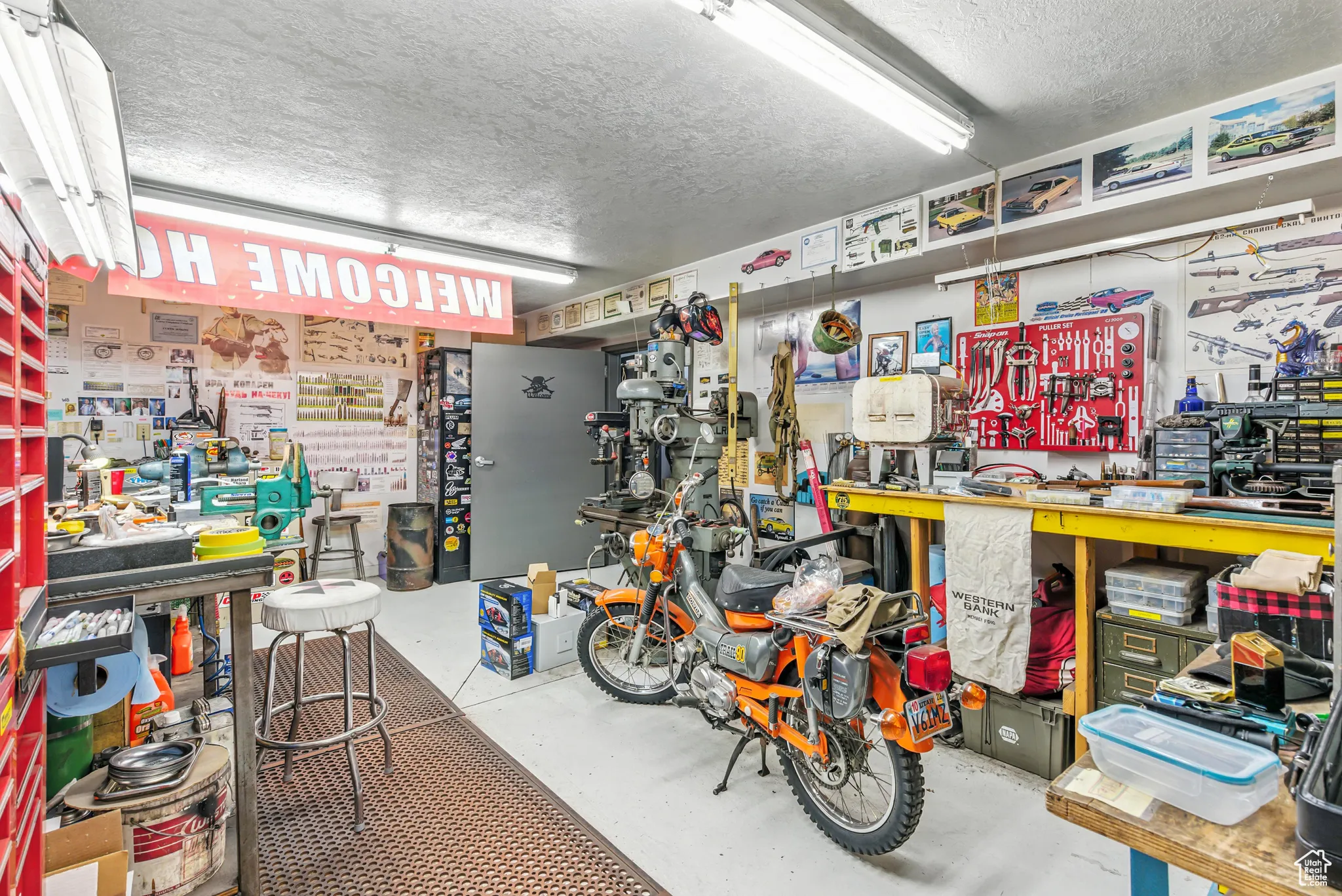 Garage featuring a workshop area