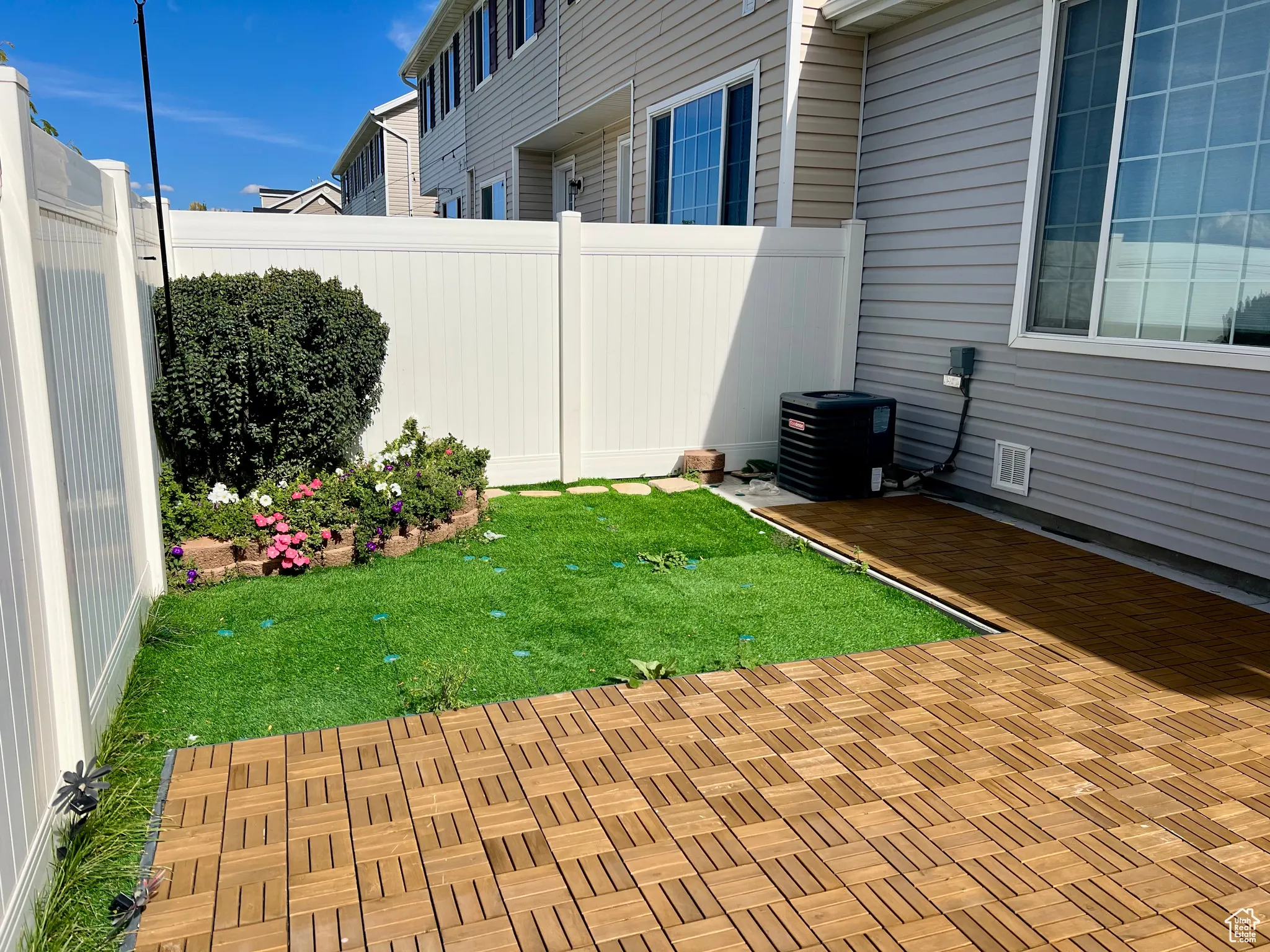 Fenced backyard featuring a patio area