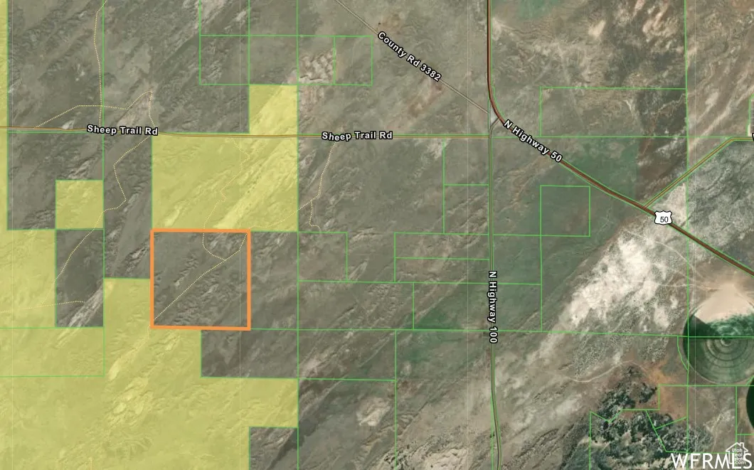 Aerial view of property's location with property parcel outlined