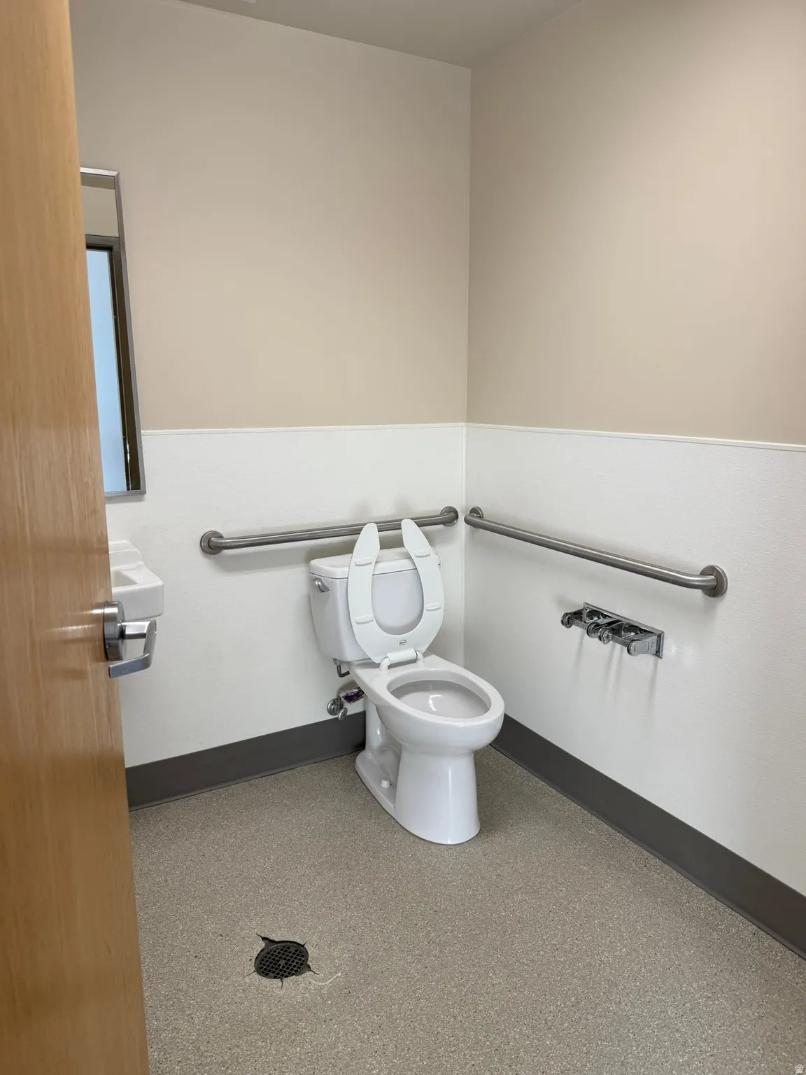 Bathroom with baseboards and toilet