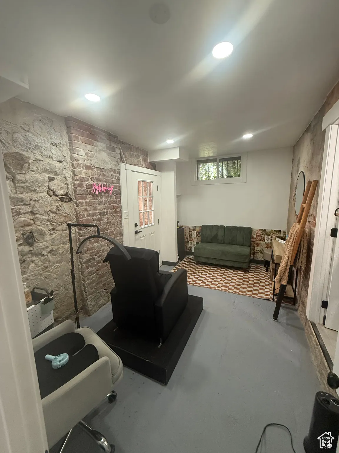Living area with concrete flooring