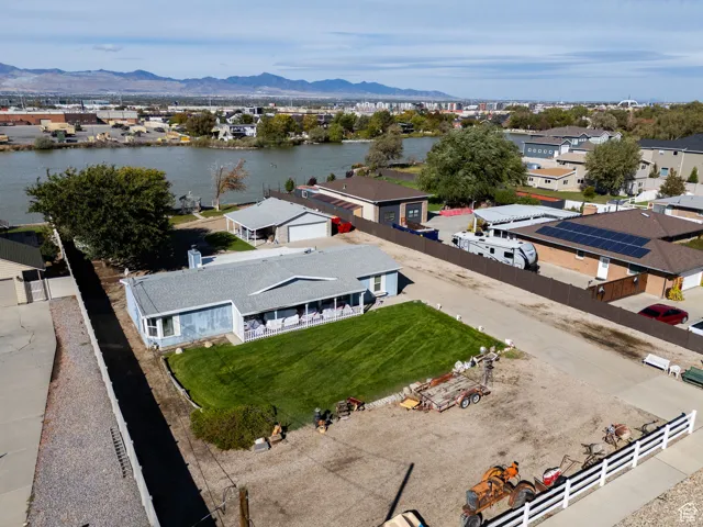 Aerial view of residential area with a water and mountain view