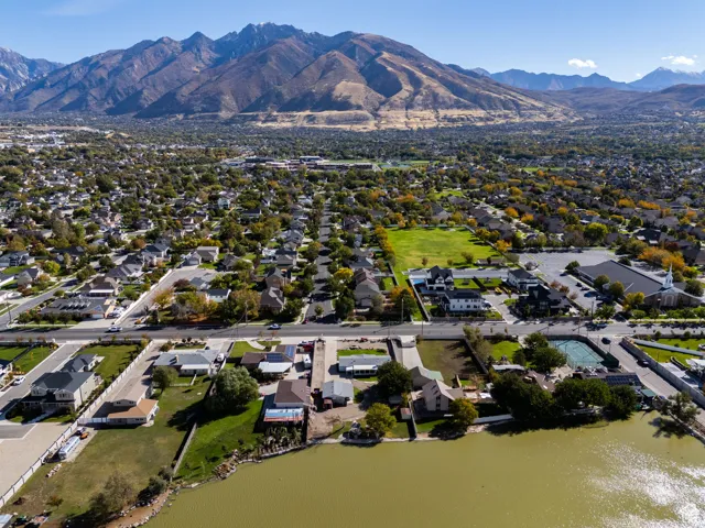 View of property location with a mountain backdrop and nearby suburban area
