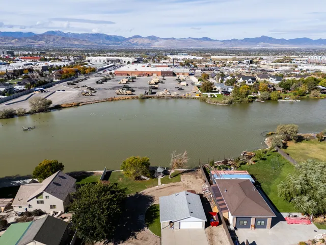 Aerial view of residential area with a water and mountain view