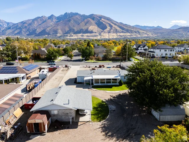 Aerial view of residential area with a mountainous background
