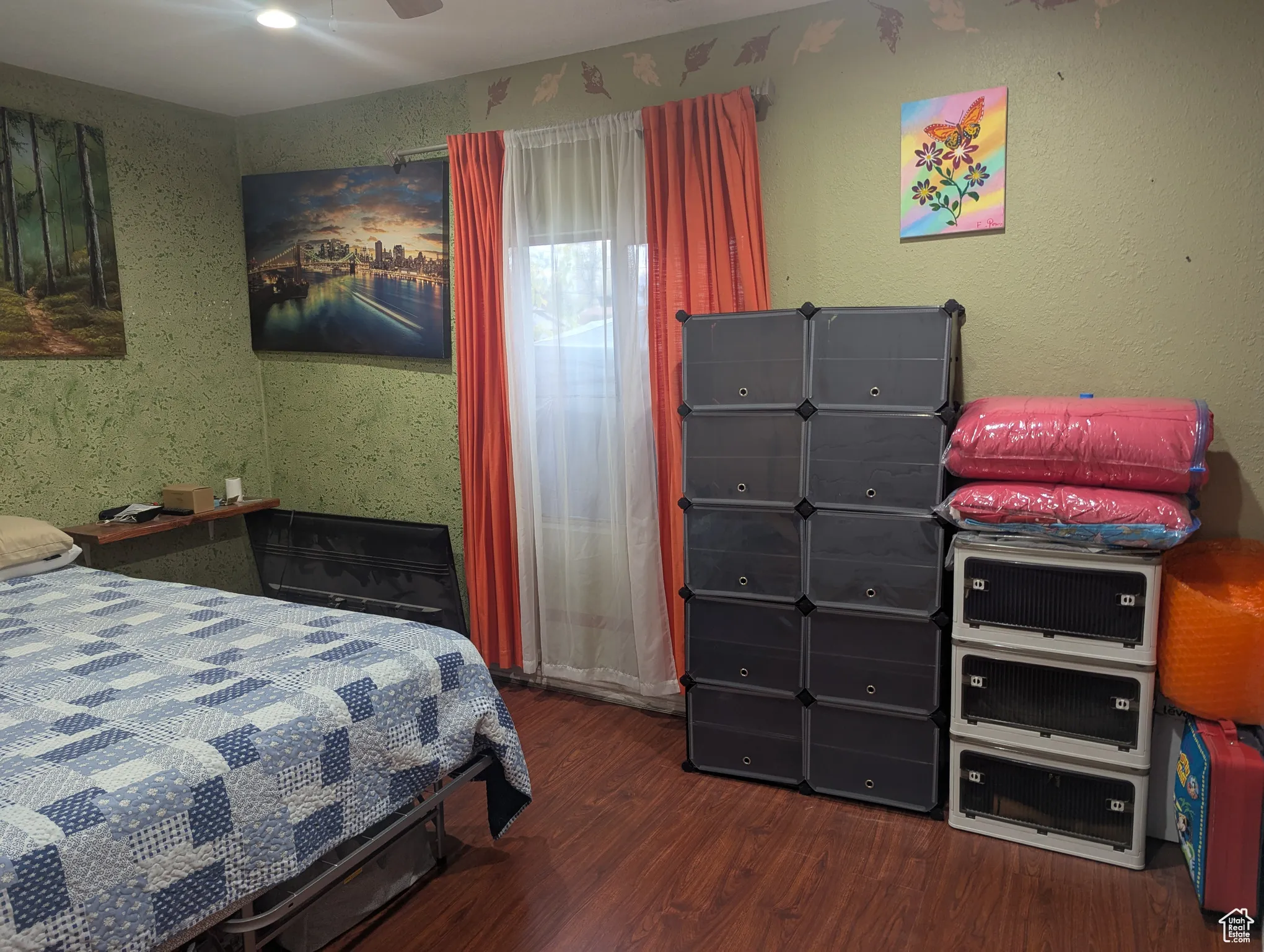 Bedroom featuring dark wood-type flooring