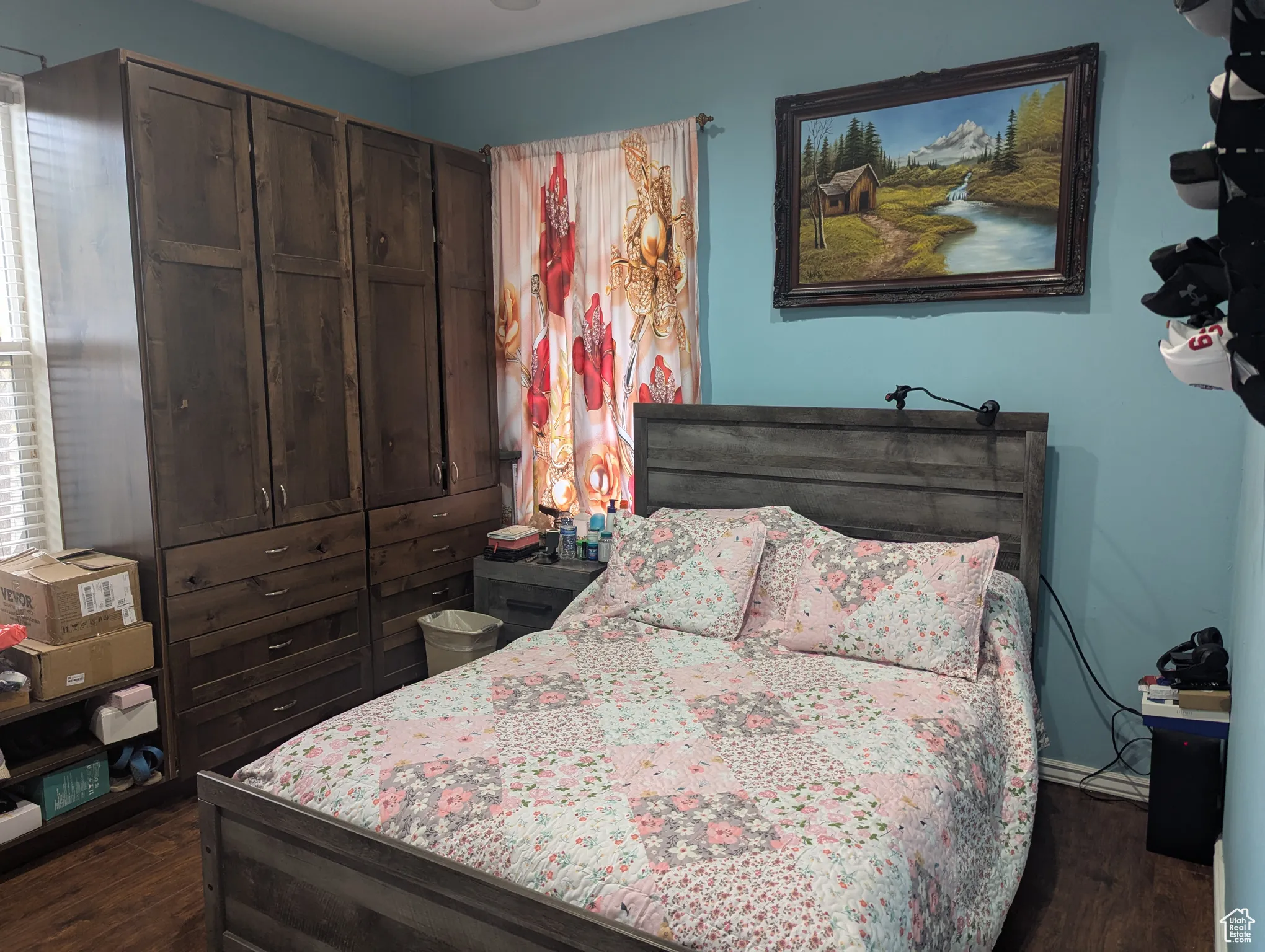 Bedroom featuring dark wood finished floors