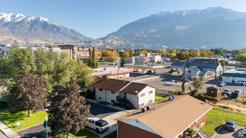Aerial view of residential area with mountains