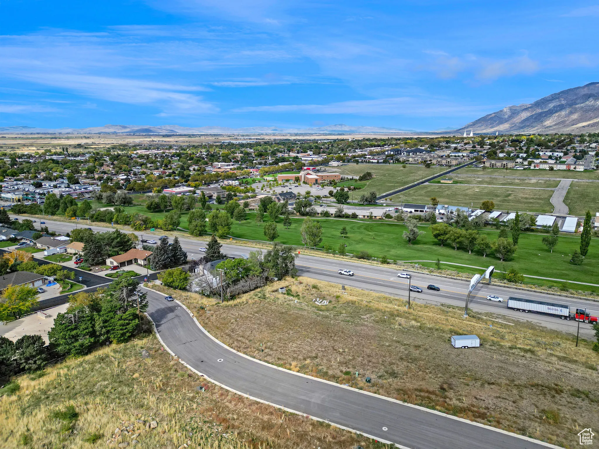 Aerial perspective of suburban area featuring mountains