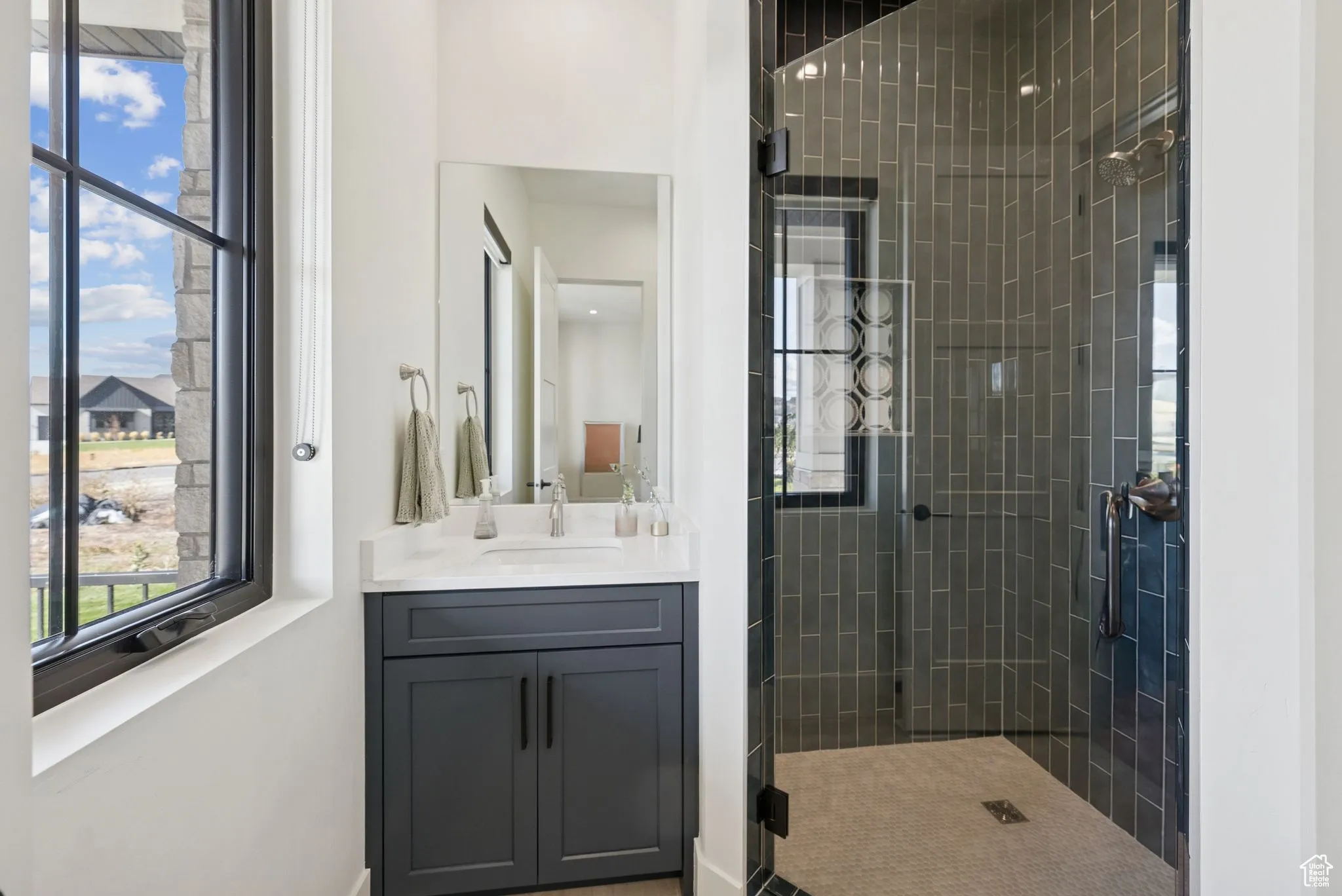 Full bath with vanity and walk in shower